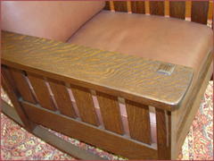 Detail of the excellent ray flake quarter-sawn white oak grain and the pinned through tenon in the arm. 